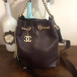 Sold. Chanel brown leather crossbody bucket